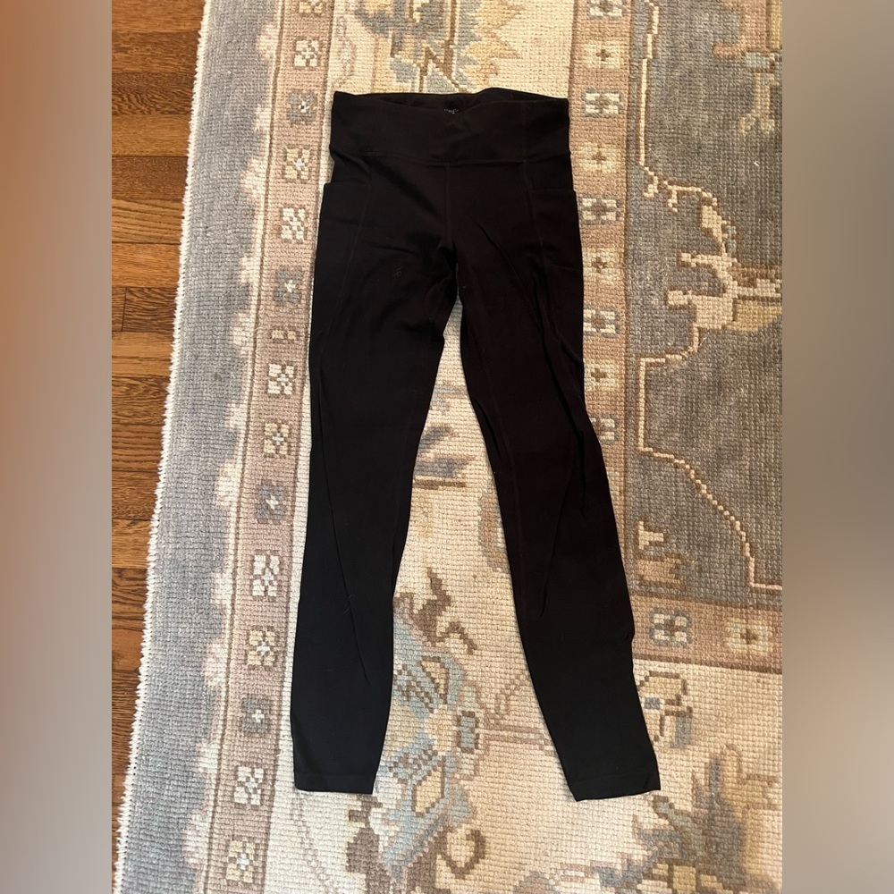 Athleta girl “Stash Your Treasures Tight” full length black leggings Size L/12